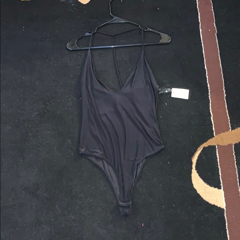 NWT. Black bodysuit